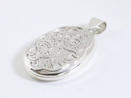 Bewerk ovaal zilveren medaillon met bloemengravering afbeelding 2