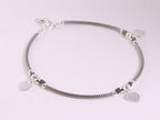 Zilveren enkelband met bewerkte kralen en hartjes afbeelding 2