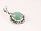 Bewerkte zilveren hanger met jade aan ketting afbeelding 2
