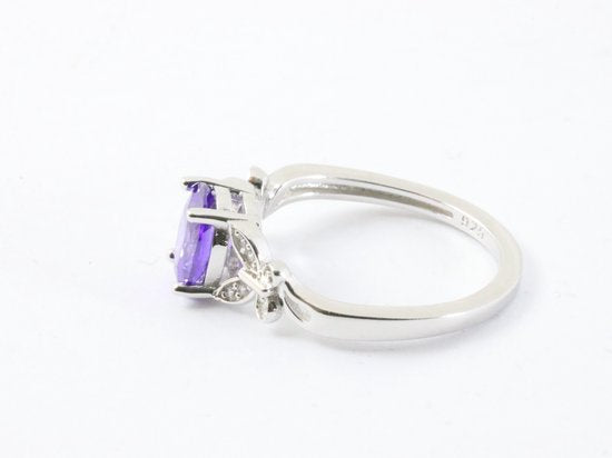 Hoogglans zilveren ring met blauwe saffier en witte topaas afbeelding 2