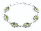 Bewerkte zilveren armband met peridoot afbeelding 1