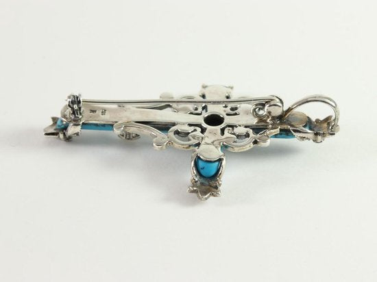 Kruisvormige zilveren broche met blauwe turkoois en marcasiet afbeelding 2