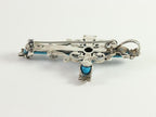 Kruisvormige zilveren broche met blauwe turkoois en marcasiet afbeelding 2
