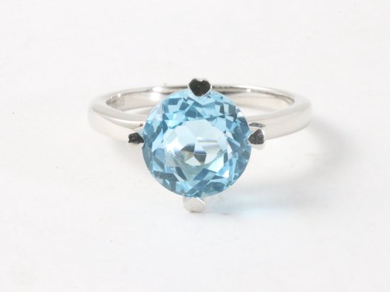 Ronde hoogglans zilveren ring met blauwe topaas afbeelding 4
