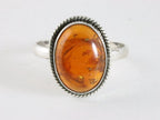 Bewerkte ovale zilveren ring met amber afbeelding 4