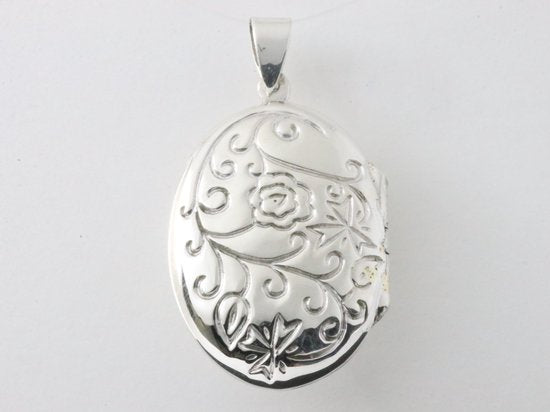 Groot bewerkt ovaal zilveren medaillon afbeelding 3