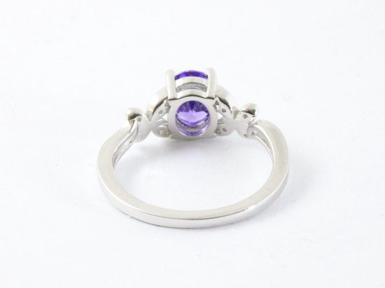 Hoogglans zilveren ring met blauwe saffier en witte topaas afbeelding 3