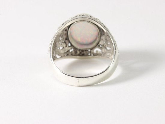Opengewerkte zilveren ring met welo opaal afbeelding 2