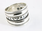 Brede zilveren ring met kabelpatronen en cirkels afbeelding 1