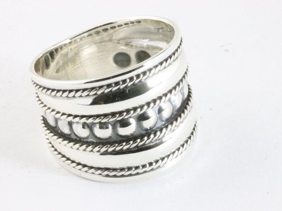 Brede zilveren ring met kabelpatronen en cirkels afbeelding 1
