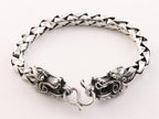 Zware zilveren armband met drakenkoppen en schubbenschakels afbeelding 1