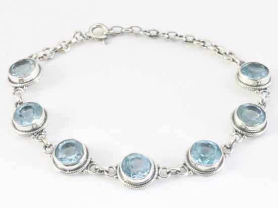 Bewerkte zilveren armband met blauwe topaas afbeelding 1