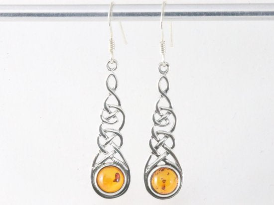 Lange opengewerkte zilveren oorbellen met amber afbeelding 4