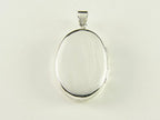 Ovaal zilveren medaillon met fantasiegravering afbeelding 3