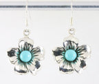 Bloemvormige zilveren oorbellen met blauwe turkoois afbeelding 1