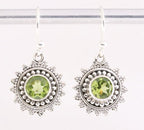 Bewerkte zilveren oorbellen met peridoot afbeelding 1