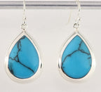 Grote druppelvormige zilveren oorbellen met blauwe turkoois afbeelding 1