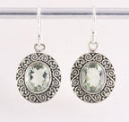 Bewerkte zilveren oorbellen met groene amethist afbeelding 1