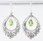 Opengewerkte zilveren oorbellen met peridoot afbeelding 1