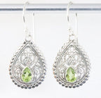 Traditionele bewerkte zilveren oorbellen met peridoot afbeelding 1