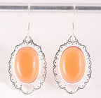 Opengewerkte zilveren oorbellen met rode vuuropaal afbeelding 1