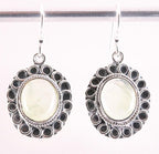 Bewerkte zilveren oorbellen met prehniet afbeelding 1