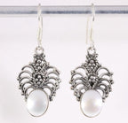 Opengewerkte zilveren oorbellen met zoetwater parel afbeelding 1
