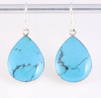 Druppelvormige zilveren oorbellen met blauwe turkoois afbeelding 1