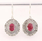 Bewerkte zilveren oorbellen met robijn afbeelding 1