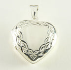Gehamerd hartvormig zilveren medaillon afbeelding 1