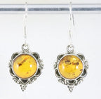 Bewerkte zilveren oorbellen met amber afbeelding 1