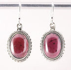 Bewerkte ovale zilveren oorbellen met granaat afbeelding 1