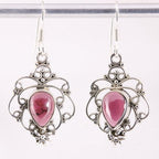 Opengewerkte zilveren oorbellen met granaat afbeelding 1