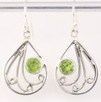 Opengewerkte zilveren oorbellen met peridoot afbeelding 1