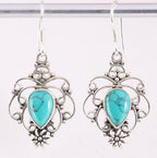 Opengewerkte zilveren oorbellen met turkoois afbeelding 1
