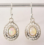 Opengewerkte zilveren oorbellen met Ethiopische opaal afbeelding 1