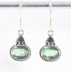 Fijne bewerkte zilveren oorbellen met groene amethist afbeelding 1