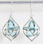 Opengewerkte zilveren oorbellen met blauwe topaas afbeelding 1