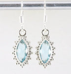 Fijne bewerkte zilveren oorbellen met blauwe topaas afbeelding 1