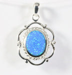 Opengewerkte zilveren hanger met Australische opaal afbeelding 1