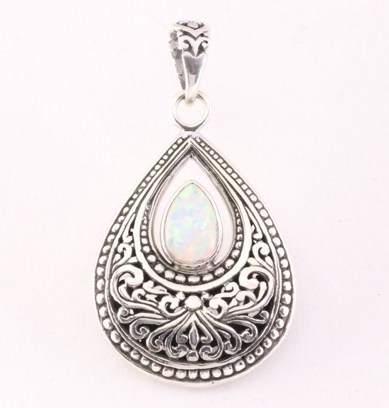 Bewerkte druppelvormige zilveren hanger met welo opaal afbeelding 1