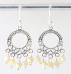 Opengewerkte zilveren oorbellen met gele maansteen afbeelding 1