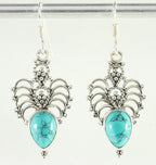 Opengewerkte zilveren oorbellen met turkoois afbeelding 1