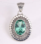 Bewerkte zilveren hanger met groene toermalijn afbeelding 1