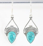 Opengewerkte zilveren oorbellen met turkoois afbeelding 1