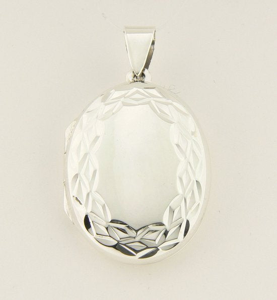 Ovaal bewerkt zilveren medaillon afbeelding 1