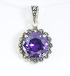 Ronde zilveren hanger met amethist en marcasiet afbeelding 1