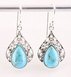 Opengewerkte zilveren oorbellen met Arizona turkoois afbeelding 1