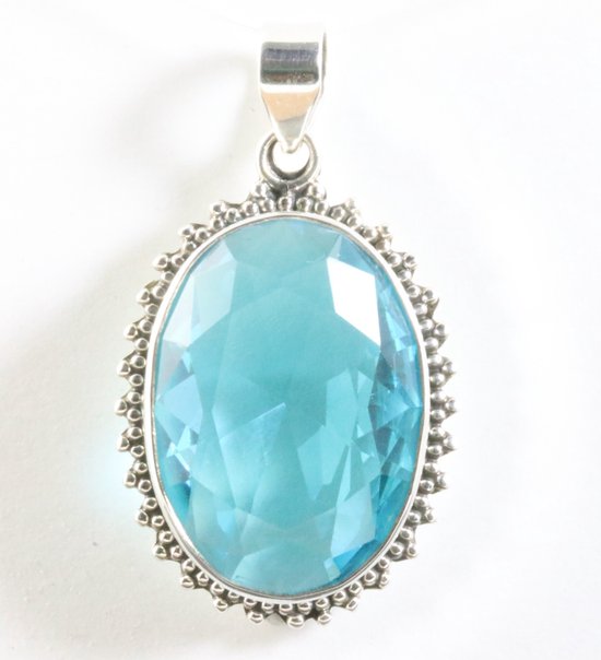 Grote bewerkte ovale zilveren hanger met blauwe topaas afbeelding 1