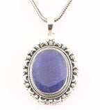 Bewerkte zilveren hanger blauwe saffier aan vossenstaart ketting afbeelding 1